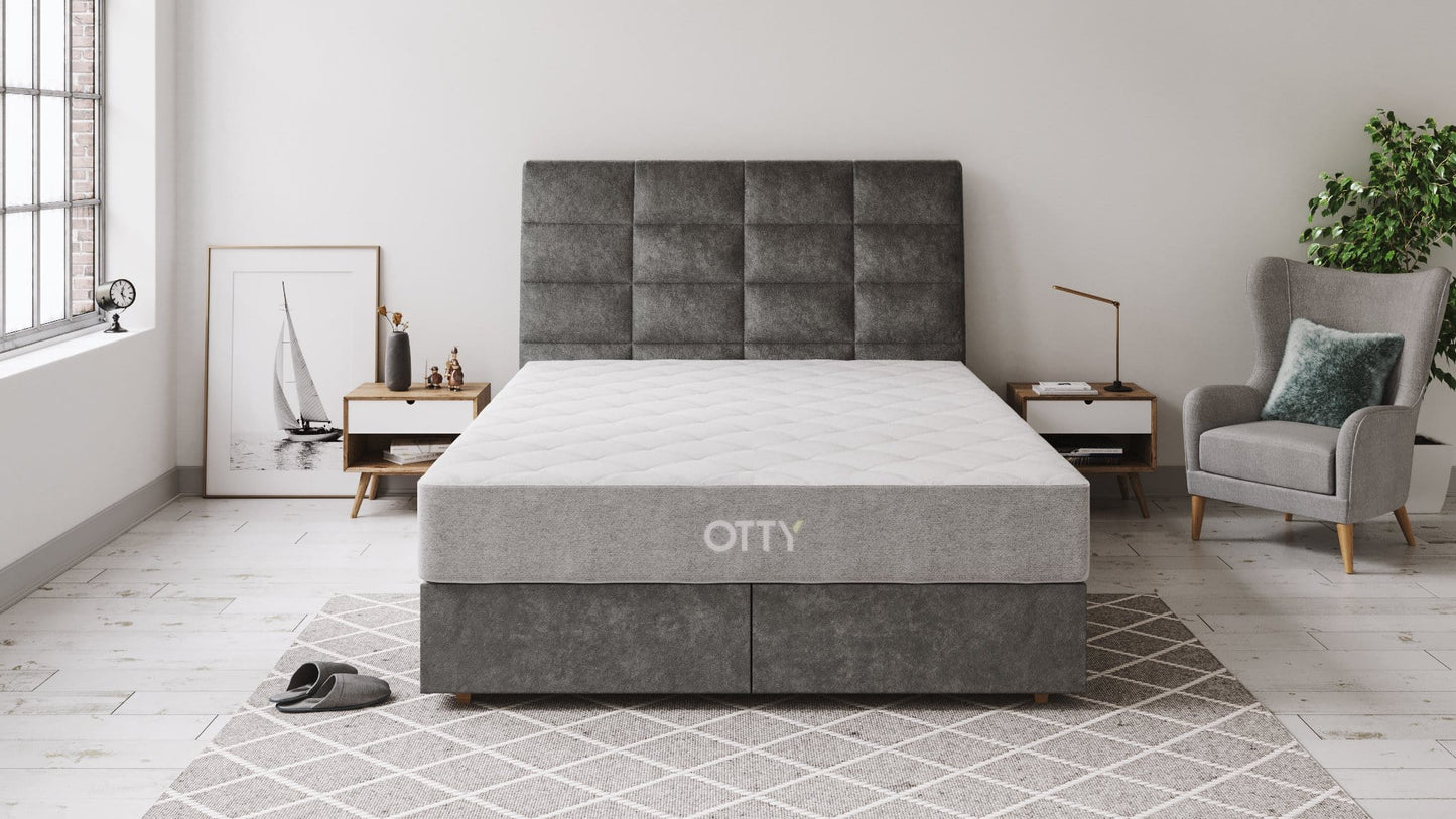 Image of the otty waterproof mattress protector on the otty origiinal hybrid mattress